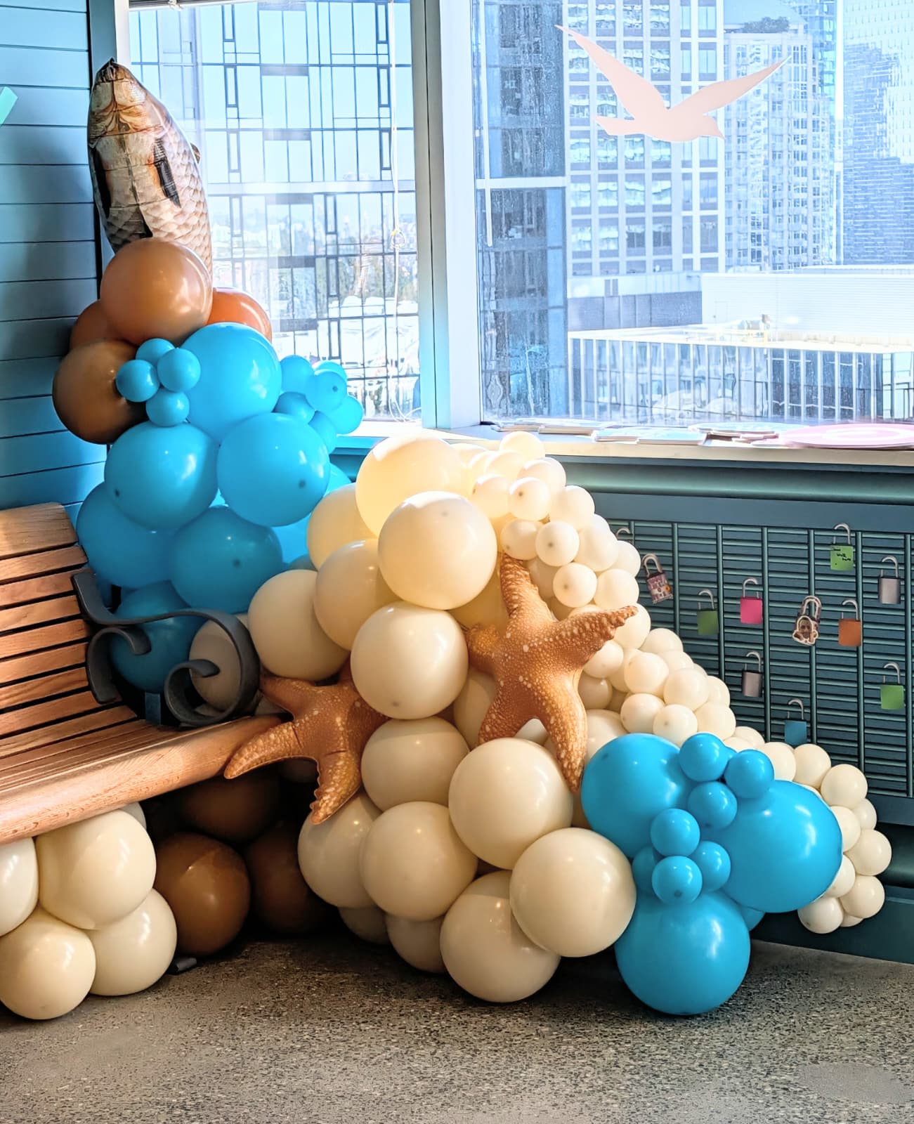 Seattle fisherman aesthetic balloon garland for corporate office decor